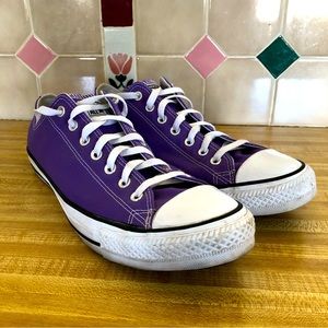 Converse Chuck Taylor low tops in purple